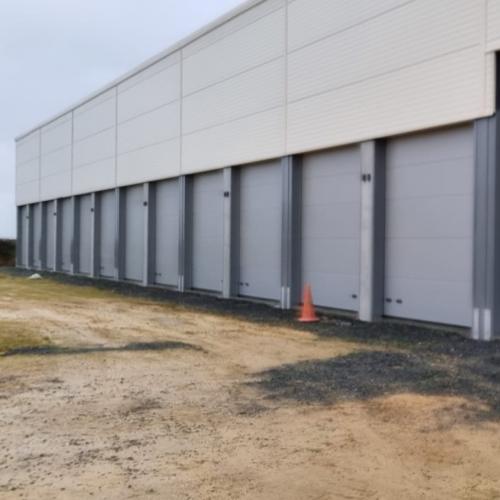 Installation de portes industrielles Hormann pour des BOX professionnels